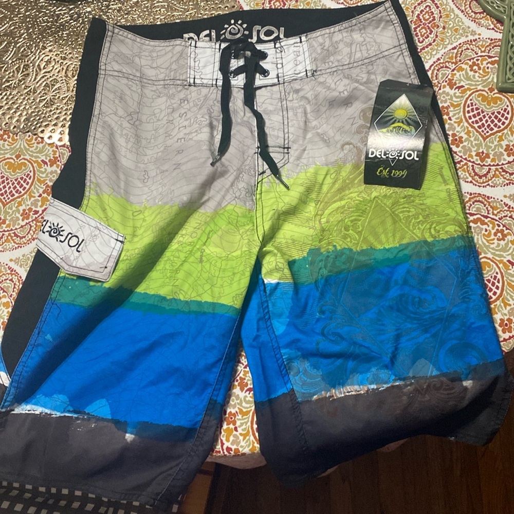 Cute Men’s Del Sol High tide swim suit trunks brand new with tags size 34M